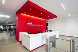 Dramatic white and red ceilings at entrance area