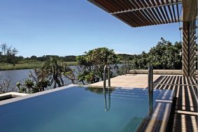 Rim Flow Pool On A Deck With A View