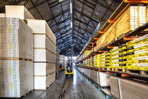 Forklift Driving Through The Pelican Systems Warehouse